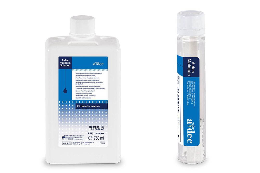 A bottle of A-dec Maintain test strips and a bottle of A-dec Maintain hydrogen peroxide solution on a white background