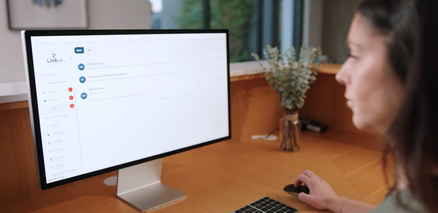 An employee looking at the Link AI inbox
