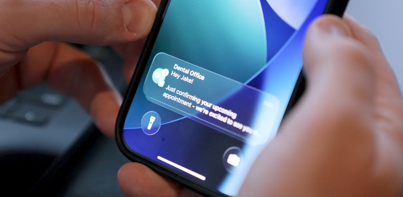 Dental practice team member using Link AI to support patient communication