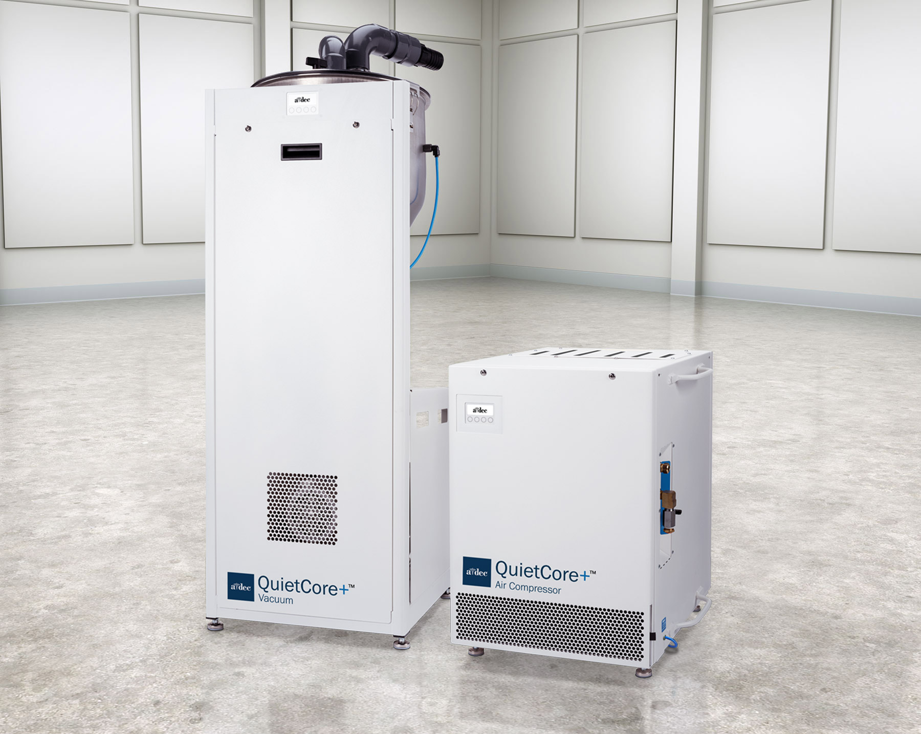 QuietCore+ dental air compressor and dry vacuum in a large room